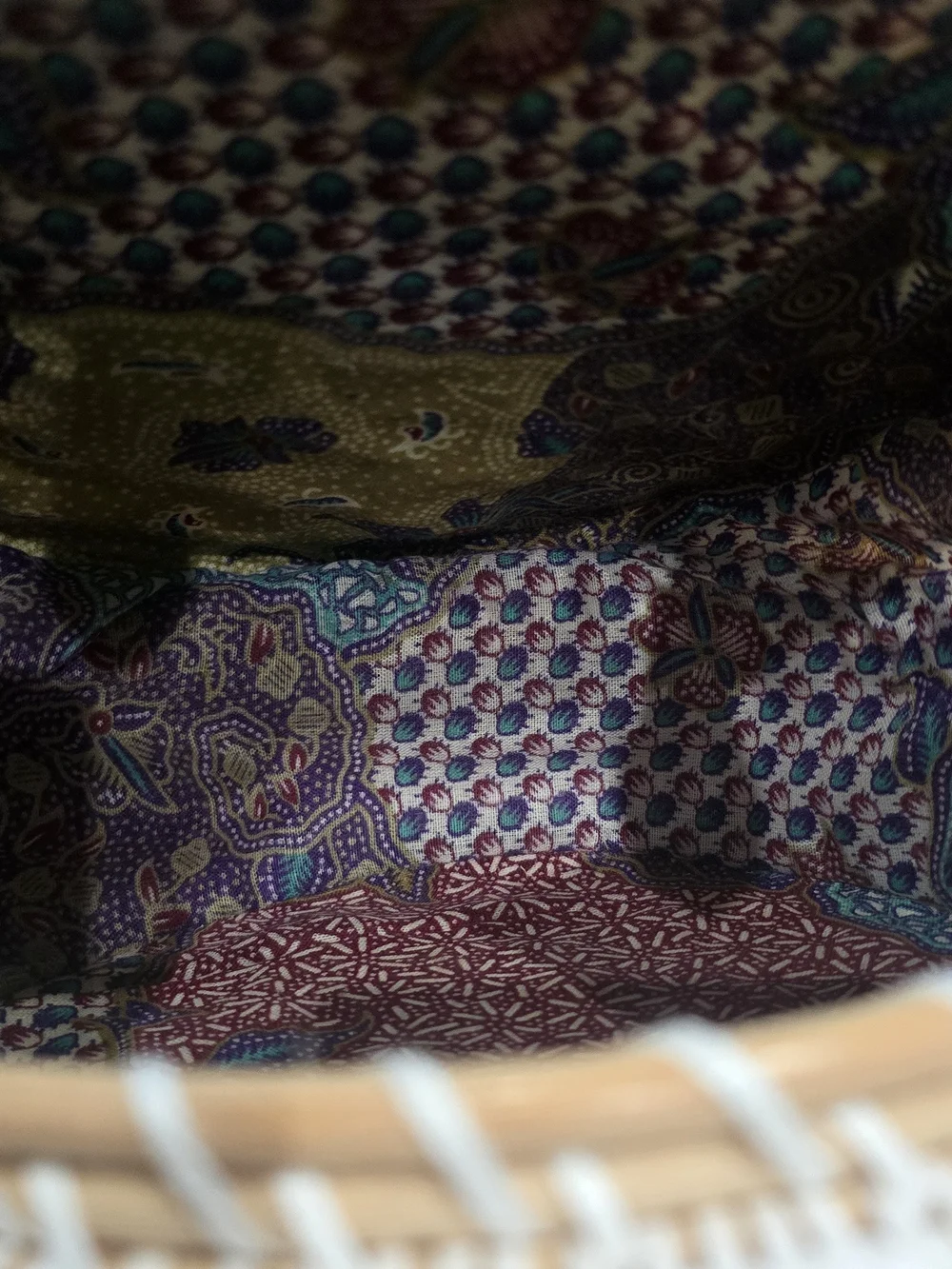 Amerii Handwoven White Rattan Medallion Crossbody Bag with Batik Lining